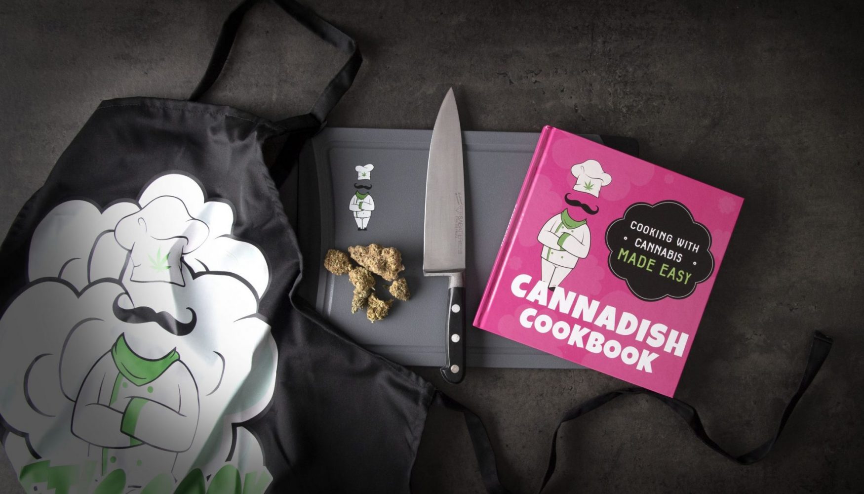 Cannabis cooking products with apron and cookbook